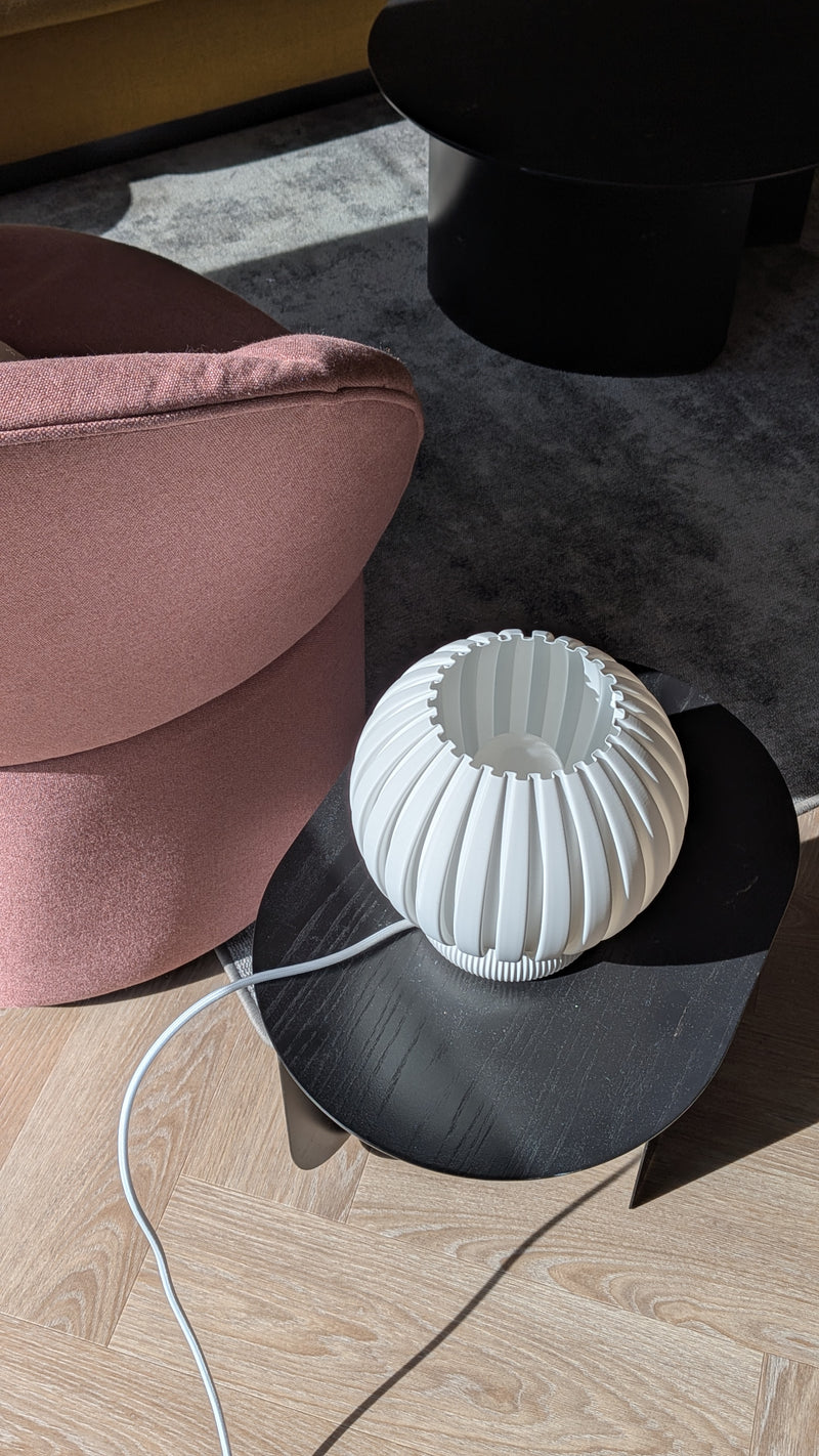 Glune table lamp close-up, warm golden light