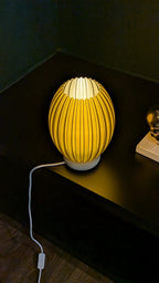 Glune Grand table lamp glowing at night, warm atmosphere